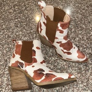 Brown and white cow print heeled booties!